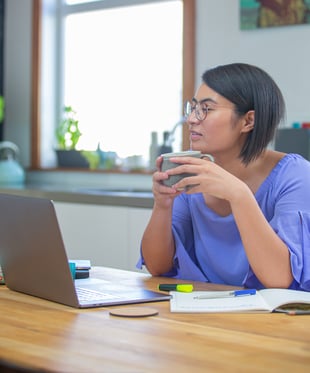 Female student completing online assignment